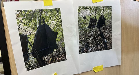 Pictures of evidence found at the fence of US president Donald Trump's golf course are shown at a press conference in West Palm Beach, Florida, on September 15, 2024 following a shooting incident at former US president Donald Trump's golf course.