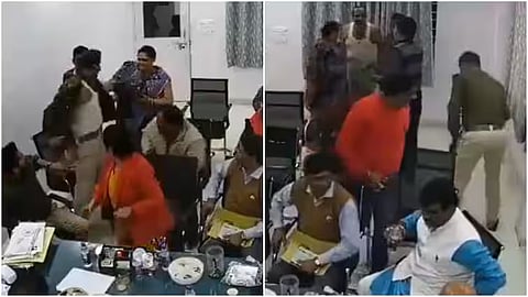 Screengrabt of the video, in which ASI Vinod Mishra is seen ripping off his uniform.
