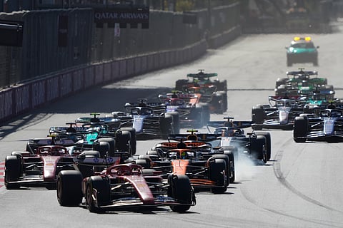 Ferrari driver Charles Leclerc of Monaco leads at the start of the Formula One Grand Prix in Baku, Azerbaijan, on Sunday.