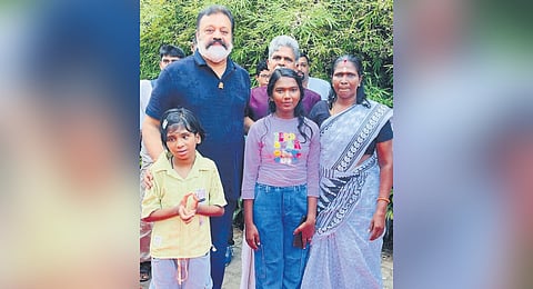 Union Minister Suresh Gopi with Rajappan and his family