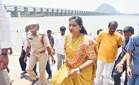 Home Minister V Anitha and Irrigation Minister Nimmala Rama Naidu inspect the boat retrieval operation at Prakasam Barrage in Vijayawada