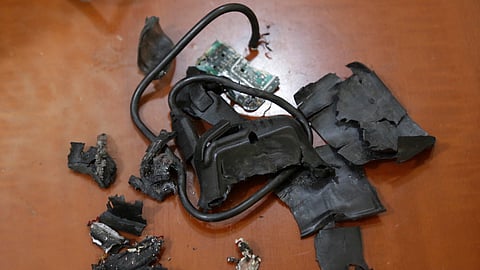 A photo taken on September 18, 2024, in Beirut's southern suburbs shows the remains of exploded pagers on display at an undisclosed location.