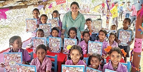 RS Swecha Society secretary Swati along with the students at the newly set up school at Tangellabanda village in ASR district on Wednesday