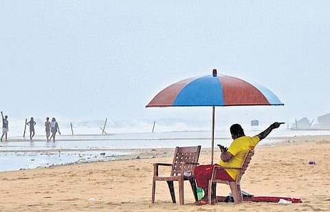 A lifeguard at Papanasam beach in Varkala