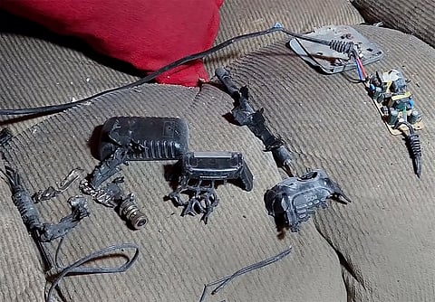 This video grab, shows a walkie-talkie that was exploded inside a house, in Baalbek, east Lebanon, Wednesday, Sept. 18, 2024