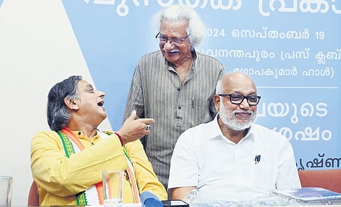 MP Shashi Tharoor and film director Adoor Gopalakrishnan at the launch of the latter’s latest book ‘Kazhchayude Suvishesham’ at the Thiruvananthapuram Press Club. CPM leader M A Baby is also seen