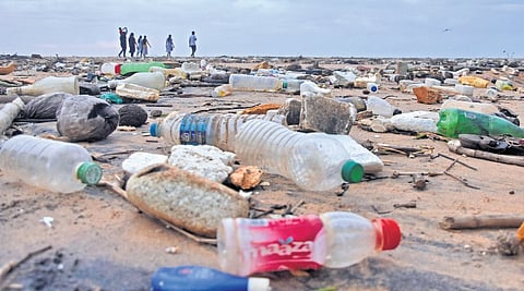 Plastic waste washed ashore remains piled up at Poonthura
