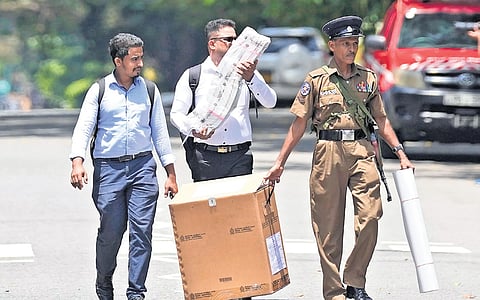 Election officials collect polling material from a distribution centre in Colombo | PTI