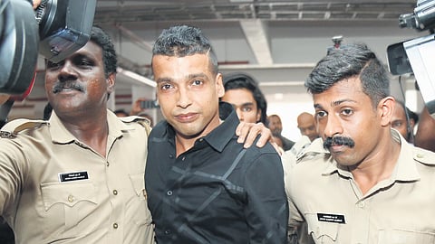 Pulsar Suni being taken out of the Ernakulam District Principal Sessions Court
after completing bail proceedings on Friday