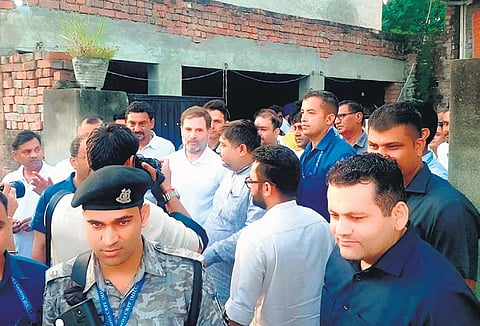 Rahul Gandhi visits the family of Amit, a youngster who was injured in a road accident in the US, in Ghogripur village in Karnal district on Friday.