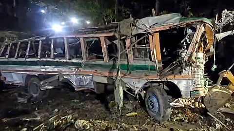 Wreckage of the bus which was carrying BSF personnel for election duty, after it fell into a gorge near Brel of Watarhaal, in Budgam district.