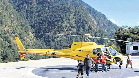 A chopper ferries pilgrims to Char Dham yatra.