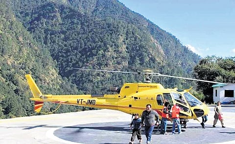 A chopper ferries pilgrims to Char Dham yatra.