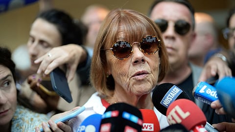 Gisele Pelicot speaks to media as she leaves the Avignon court house, southern France.
