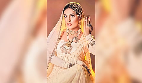 Divgikar is equally known for their flamboyant style, often seen in sarees but also drawing inspiration from international artists.