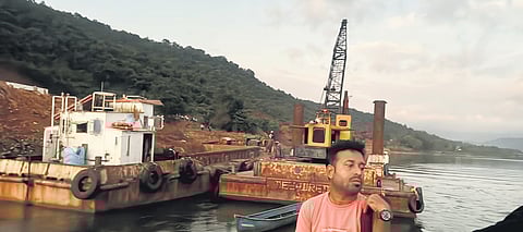 The dredging machine at work in the Gangavalli river