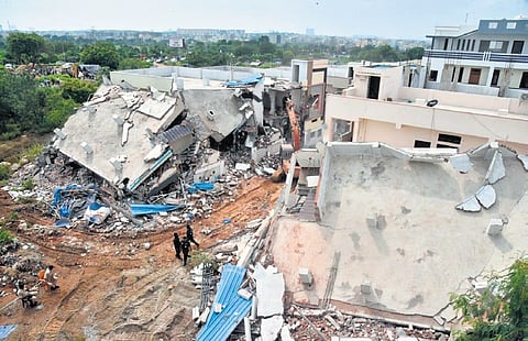 HYDRAA demolitions encroachments on Ameenpur lake in Hyderabad on Sunday