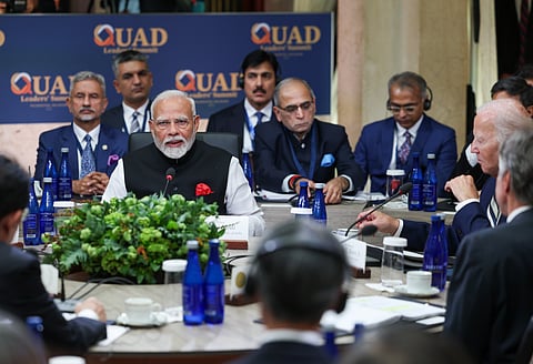Prime Minister Narendra Modi speaks as US President Joe Biden looks on at the Quad Leaders Summit at Archmere Academy in Claymont, Delaware, USA, Saturday, Sept. 21, 2024.