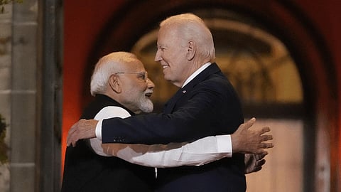US President Joe Biden embraces Prime Minister Narendra Modi as he leaves the Quad leaders summit at Archmere Academy in Claymont, Del., Saturday, Sept. 21, 2024.