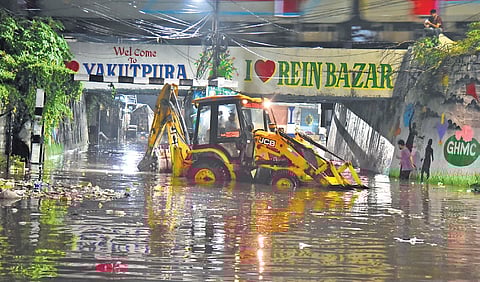 No reining in floods: A waterlogged road in Rein Bazar, Yakutpura, on Monday