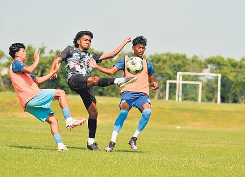 Niranjan Anish (black jersey) in action