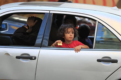 Cars sit in traffic as people flee the southern villages amid ongoing Israeli airstrikes, in Sidon, Lebanon, Monday, Sept 23, 2024.