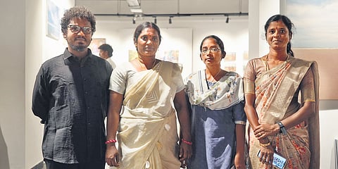 Mentor Palanikumar with three fisherwomen-photographers