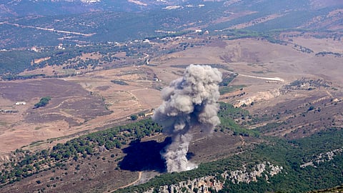 Smoke rises from an Israeli airstrike on the Mahmoudieh mountain, as seen from Marjayoun town, south Lebanon, Tuesday, Sept. 24, 2024.