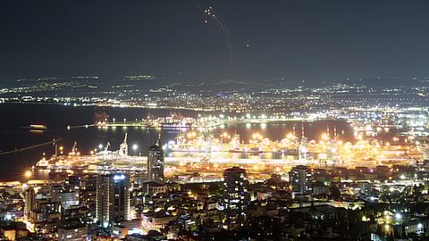 Israeli Iron Dome air defense system fires to intercept rockets that were launched from Lebanon, in northern Israel, Tuesday, Sept. 24, 2024.