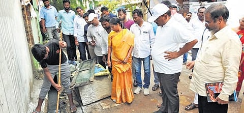 GMC Commissioner P Srinivasulu, and Guntur West MLA Galla Madhavi inspecting the sanitation works in the 49th division of Guntur on Thursday