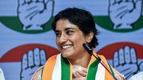 Wrestler-turned-politician Vinesh Phogat speaks after joining the Congress, at AICC headquarters in New Delhi.