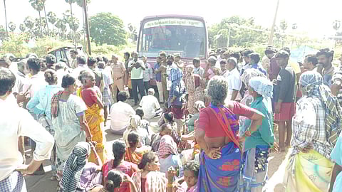 Image of villagers staging a road blockade used for representative purpose only.