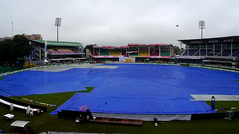 Covers placed on the ground following rains, during the second day of the second Test match between India and Bangladesh at the Green Park Stadium, Kanpur