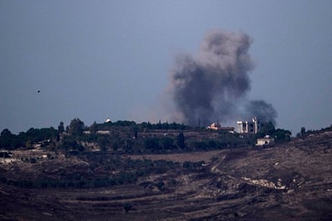 Smoke rises following an Israeli airstrike in southern Lebanon as seen from northern Israel, Monday, Sept. 30, 2024