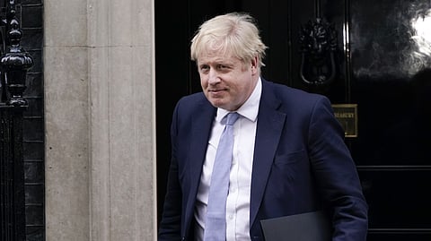 Former British Prime Minister Boris Johnson leaves 10 Downing Street as he makes his way to the House of Commons in London.