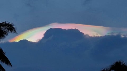 The ‘mini Aurora Borealis’ occurred due to ice crystals in iridescent cloud scattering light, creating a rainbow-like effect, say scientists