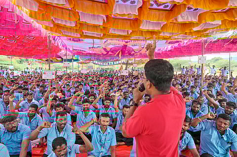Samsung workers who are on strike shout slogans during a protest near their plant in Sriperumbudur, on the outskirts of Chennai, India, Tuesday, Sept. 24, 2024.
