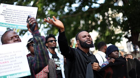 Protesters carry placards during the "Fearless In October" protest over bad governance in Abuja, Nigeria on October 1, 2024.