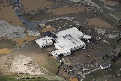 An aerial view of flood-damaged Unicoi County Hospital in the aftermath of Hurricane Helene, Saturday, Sept 28, 2024, in Erwin, Tenn.