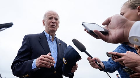 US President Joe Biden speaks to the media before boarding Air Force One at Joint Base Andrews, Md., Wednesday, Oct. 2, 2024.