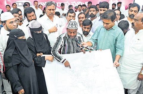 BRS working president KT Rama Rao with people affected by the Musi project and HYDRAA, at Telangana Bhavan in Hyderabad on Wednesday