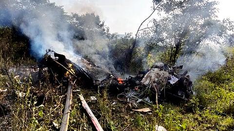 Wreckage of a helicopter after it crashed at Bavdhan area in Pune district.