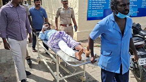 Two suspects arrested in a murder case in Tiruppur suffered fractures on their legs during an escape attempt on Thursday during
