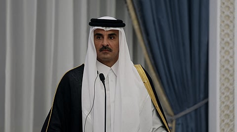 Qatar's Emir Sheikh Tamim bin Hamad al-Thani gives a joint press conference with Iran's President, in Doha on October 2, 2024.