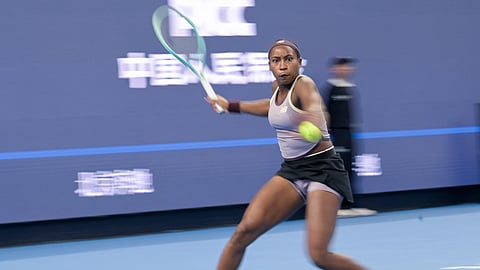 USA’s Coco Gauff hits a return to Ukraine’s Yuliia Starodubtseva during their women's singles quarterfinal match at the China Open tennis tournament in Beijing