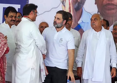 Leader of Opposition in Lok Sabha and Congress leader Rahul Gandhi with former MP Ashok Tanwar in Mahendragarh district, Haryana on Thursday.