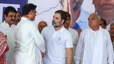 Leader of Opposition in Lok Sabha and Congress leader Rahul Gandhi with former MP Ashok Tanwar in Mahendragarh district, Haryana on Thursday.
