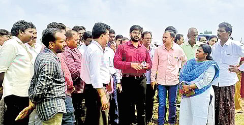 TGNPDCL Chairman and Managing Director(CMD) Karnati Varun Reddy explaining the advantages of the solar power project to the residents of Siripuram on Friday