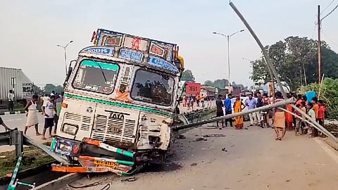 A damaged truck is seen after a collision with a tractor trolley, in Mirzapur district.