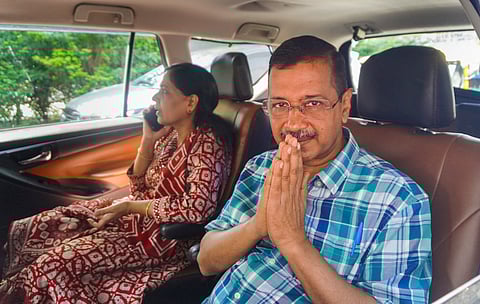 Former Delhi chief minister Arvind Kejriwal and wife Sunita Kejriwal leave after vacating the official residence at Civil Lines area, in New Delhi, Friday, Oct. 4, 2024.